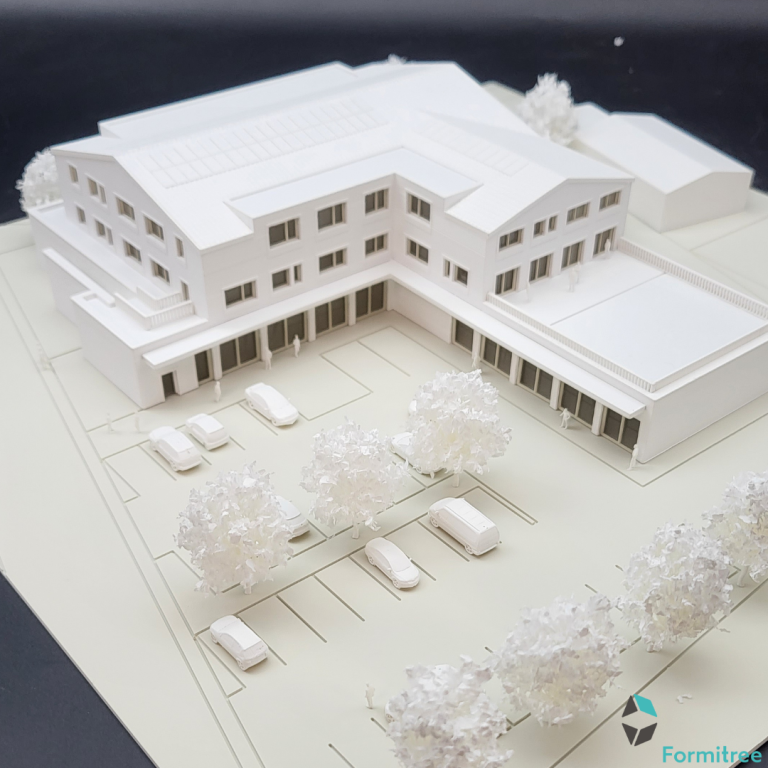 Ein Architekturmodell mit Miniaturbäumen von Pimpmymodel