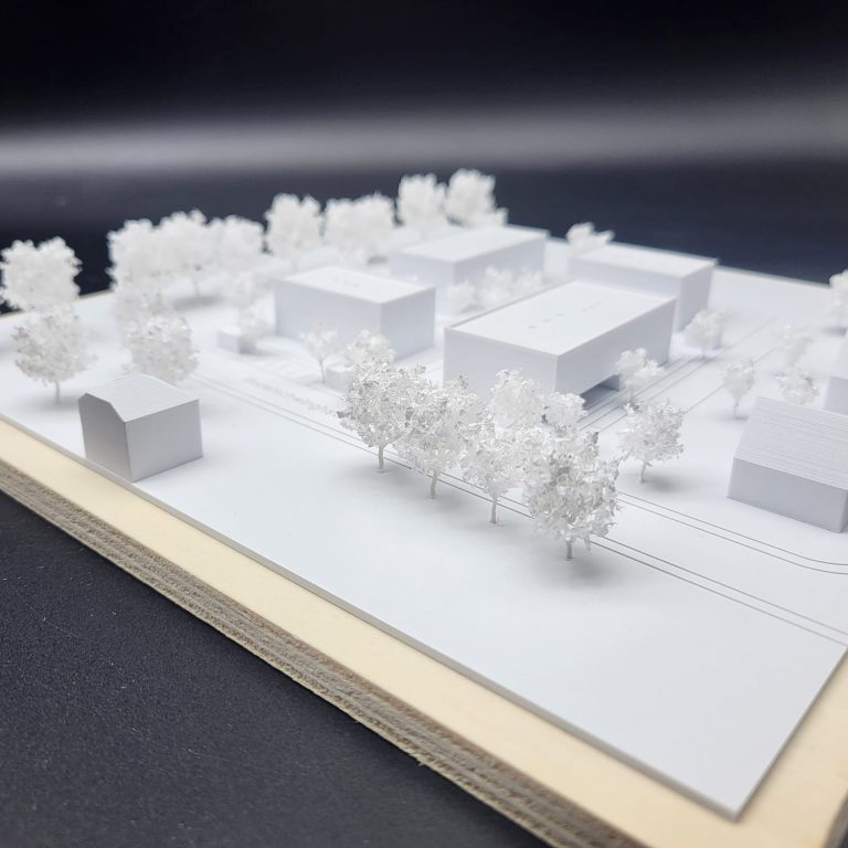 Ein Architekturmodell mit Miniaturbäumen von Pimpmymodel