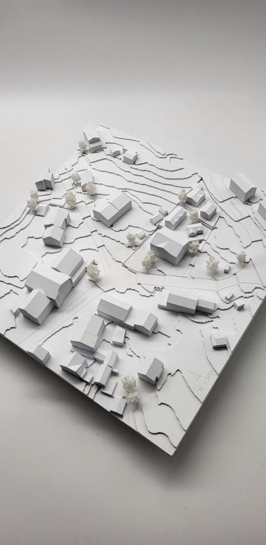 Ein weißes Architekturmodell Maßstab 1:1000